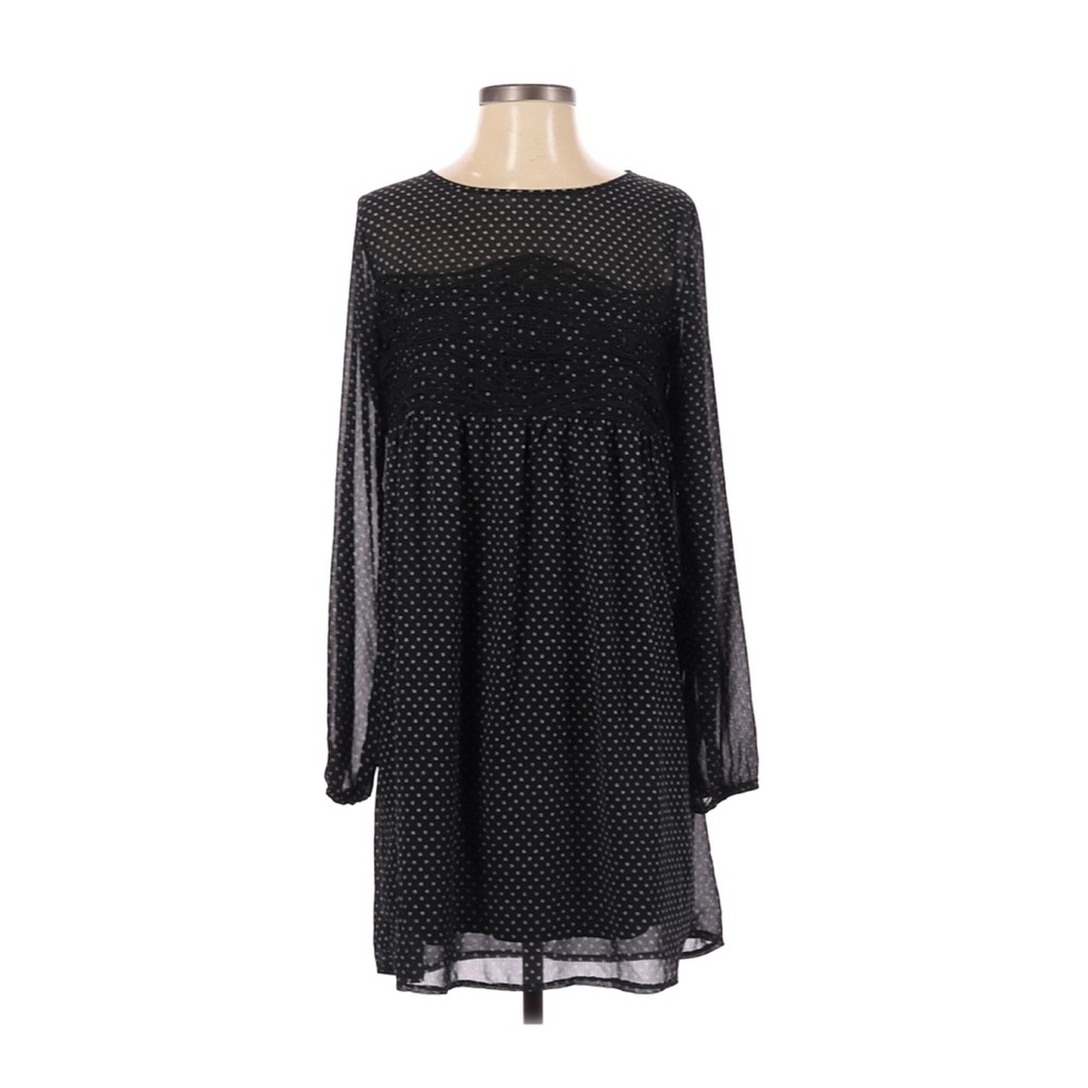 Sheer black dress with polka dots and lace
